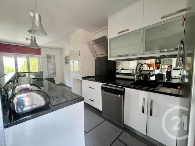 Afficher la photo en grand Appartement Duplex à vendre - 4 pièces - 80.01 m2 - FONTAINES SUR SAONE - 69 - RHONE-ALPES - Century 21 L'Immobilière Des Combattants